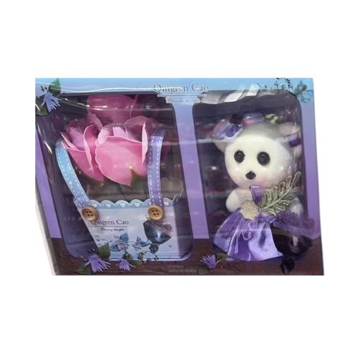 Soft teddy bear in gift box